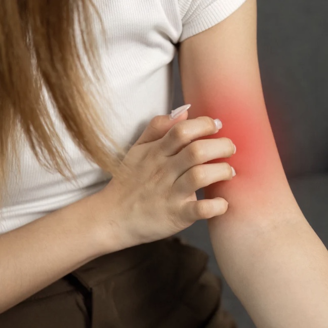 Young slim woman enjoys weight loss result